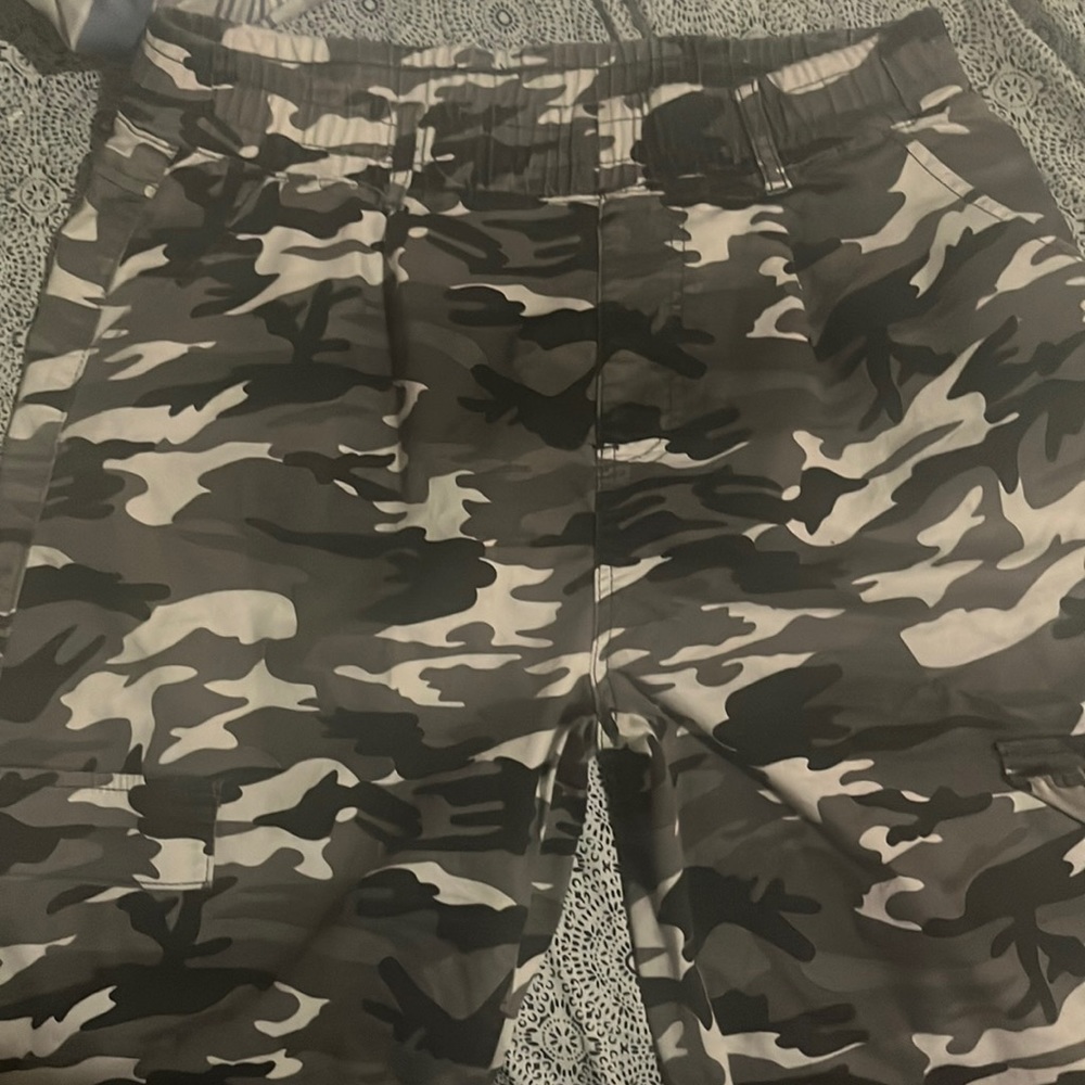 V.I.P cargos. colors grey , white, and black.  they have 4 pockets.